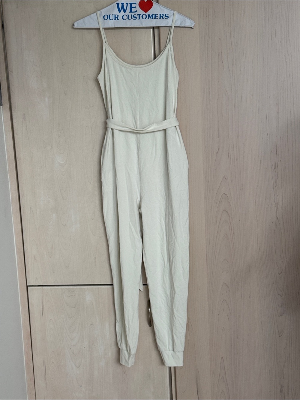 A Pea in the Pod Burgundy Maternity Jumpsuit with Tie Waist with side pockets